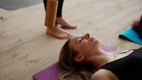 meditation with using sound instrument, led by trainer