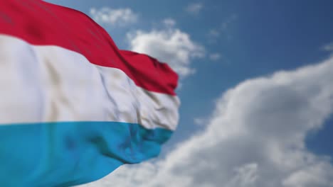 realistic luxembourg flag is waving slowly.