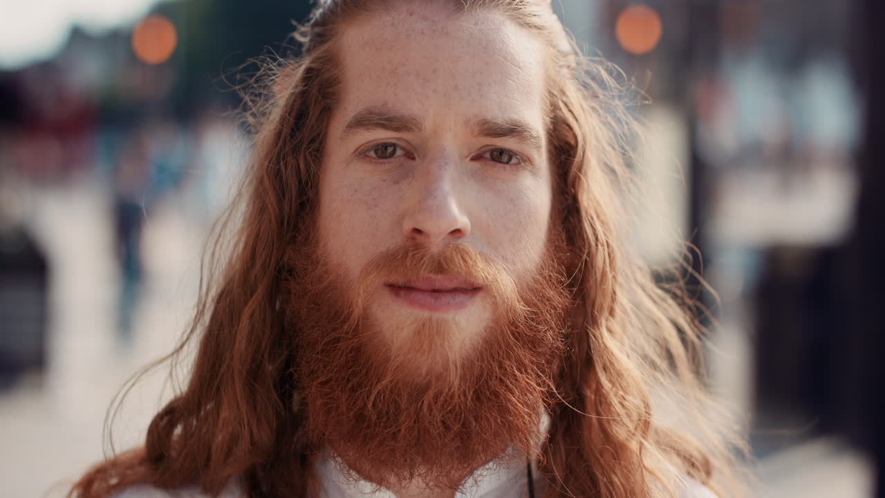 Man with Red Hair and Beard in Urban Setting