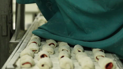 Covering-Bread-Dough-On-A-Tray-With-Cloth-While-Rising-To-Keep-It-From-Drying-Out---close-up