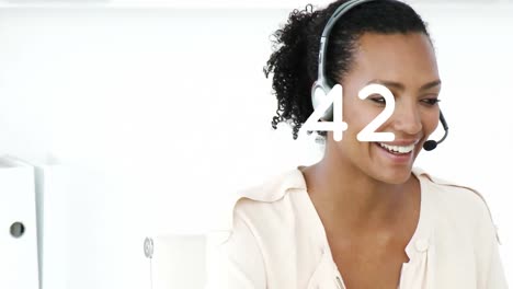 Animation-of-numbers-changing-over-businesswoman-using-phone-headset