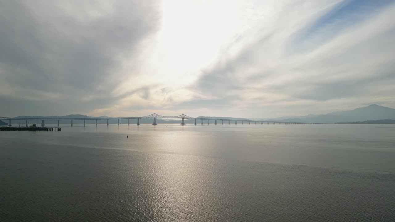 Drone shot during the winter season highlighting the Richmond–San Rafael Bridge near Point Molate Beach.
