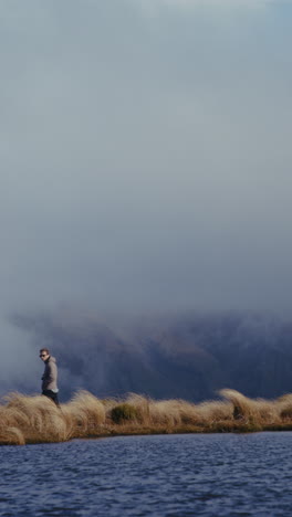 misty mountain landscape with person