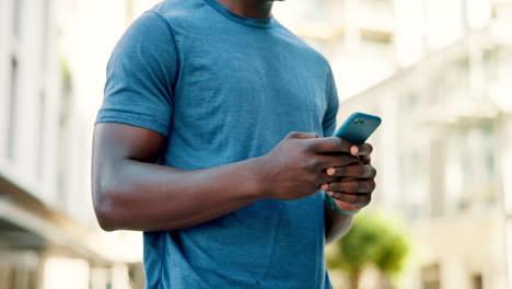 man texting on smartphone