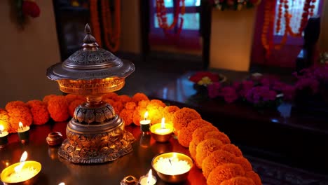 indian religious ceremony with candles and flowers