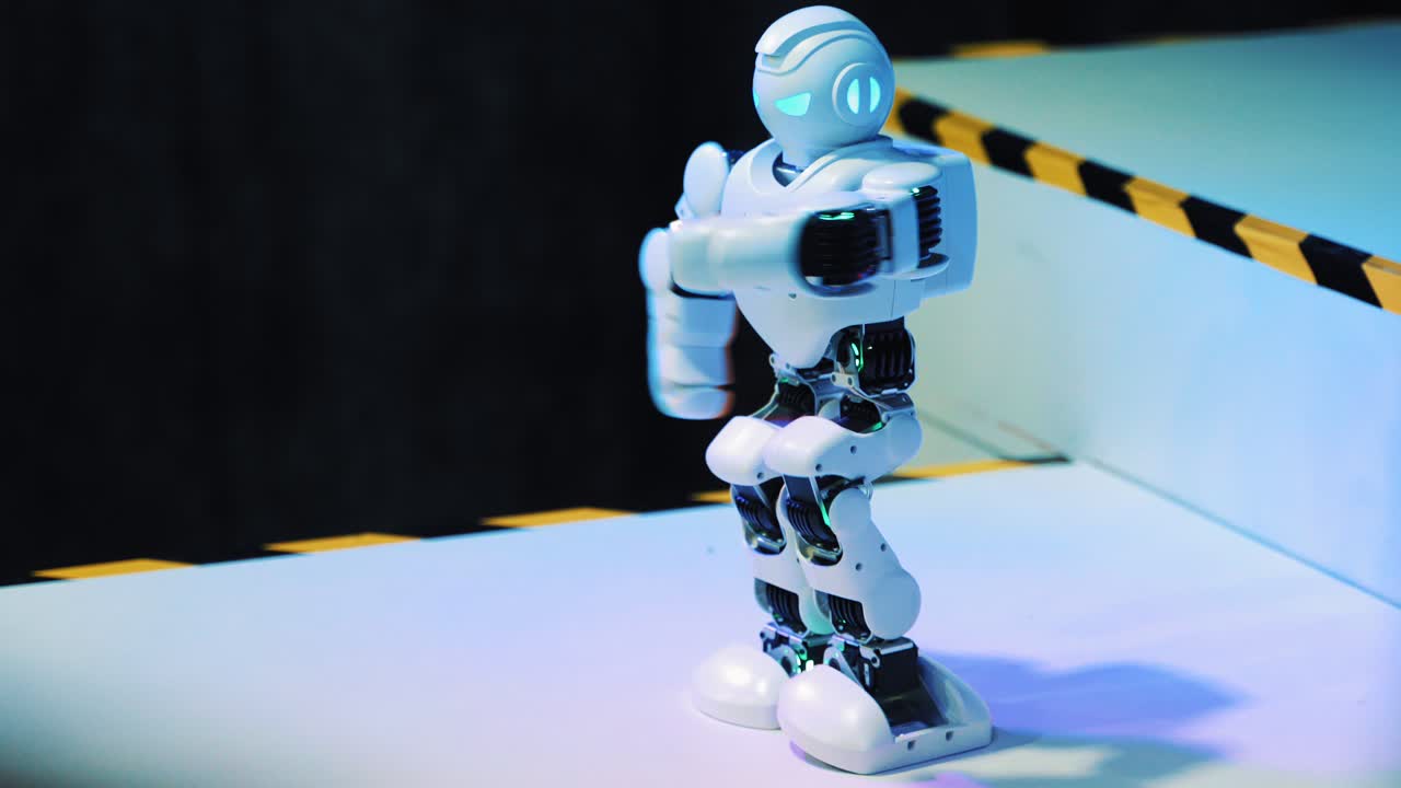 Robot dancing and moving at technology exhibition. Future and robotic concept. Smart Robot