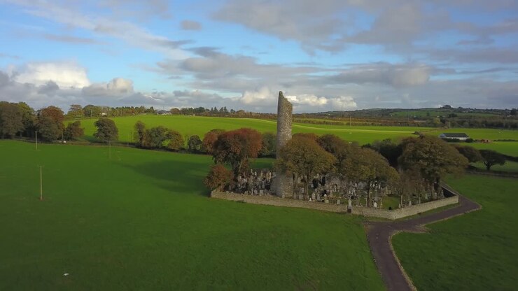 Monasterboice monastery round tower drone reveal shot