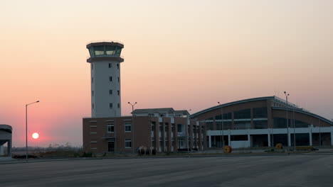 air traffic control against the sunset at the international terminal of gautam buddha airport in nepal