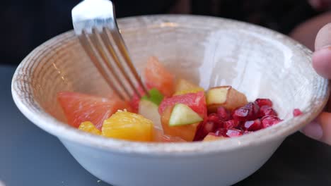 fruit salad being eaten