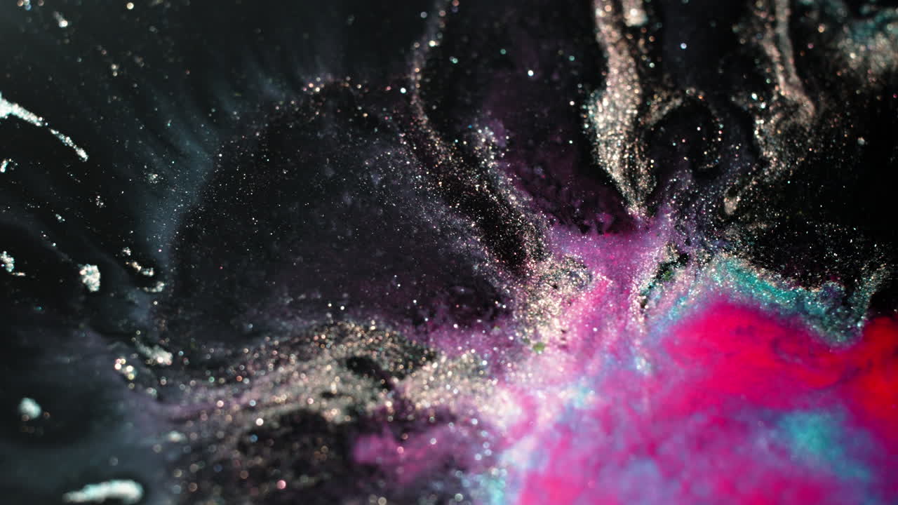 Vibrant substances mix in macro, creating abstract art with color swirls