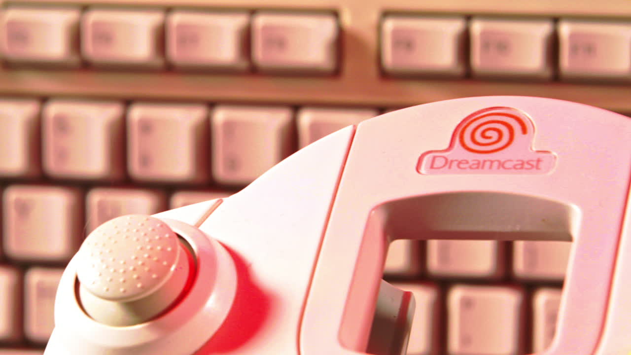 Sega Dreamcast Controller with Keyboard in Background SLIDE LEFT