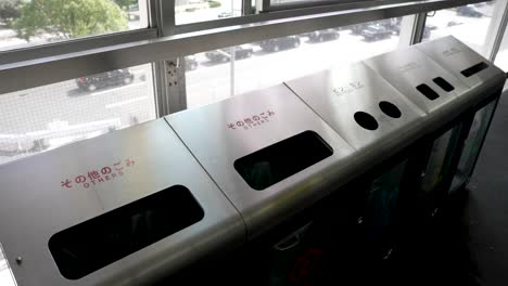 metal recycling trash bins located on shin osaka station platform