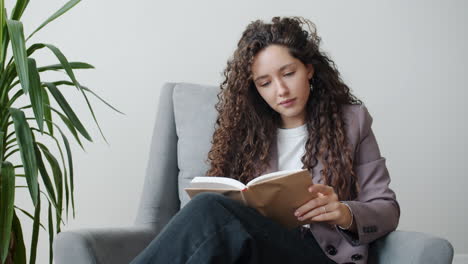 woman reading in a chair