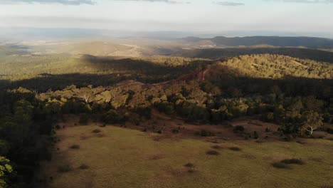 drone flight over the australian outback-bush, at sunset