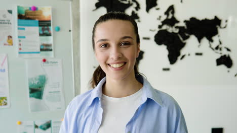 woman posing in a travel agency