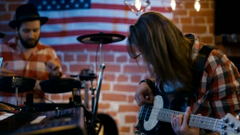 creative band setting music and practicing