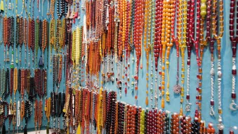 tracking shot of colourful beads