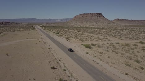 aerial drone shot of vehicle travelling on route 66