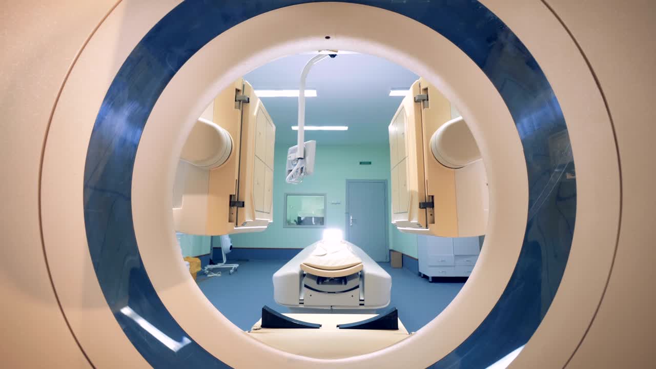 캐트 스캐너의 타 링을 통해 볼 수 있는 스캐닝 플랫폼을 낮추는