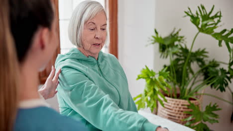 elderly woman with weights for exercise