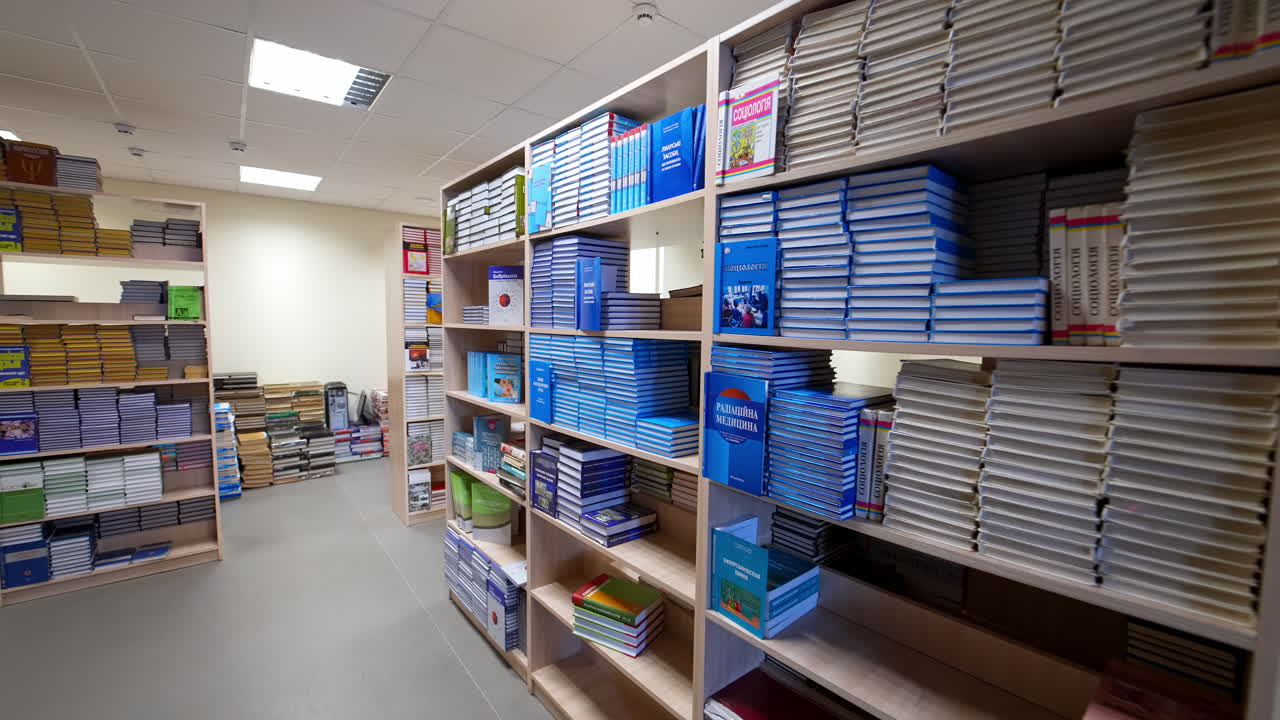Bookshelves in library with old books. Large bookcase with lots of books at library