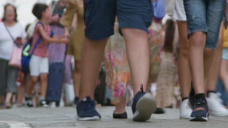 people walking on a city street