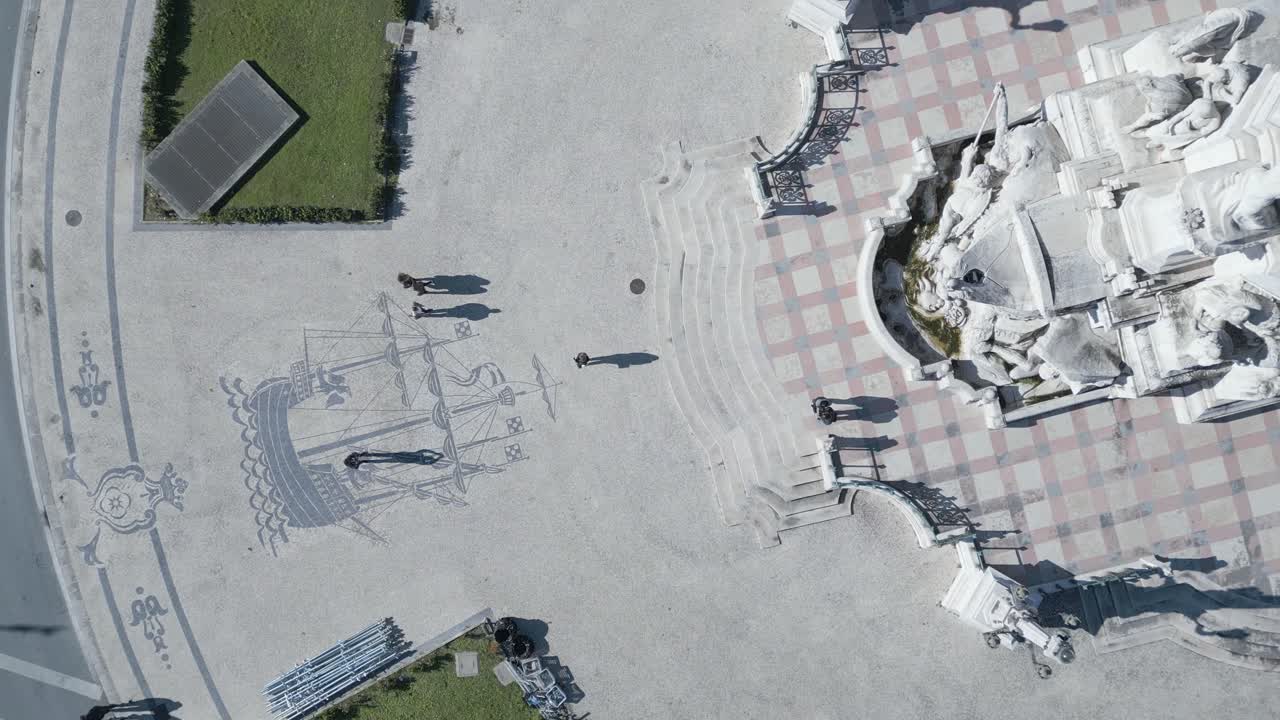 Daytime areal view of Marqu&ecirc;s de Pombal Square, located in the heart of Lisbon, Portugal, this iconic square is a central hub that seamlessly blends historical significance with modern vitality