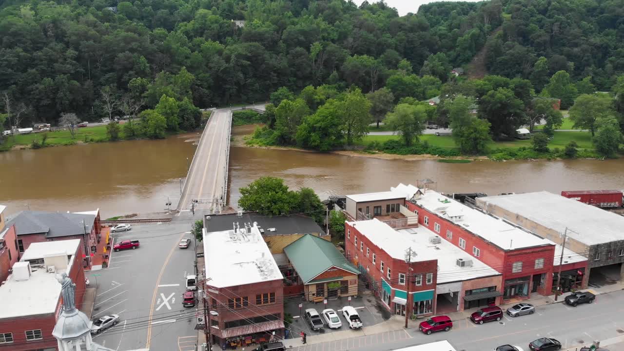 4K Aerial Drone Video of a Freight Train passing through Downtown Marshall, NC along the French Broad River (2021)