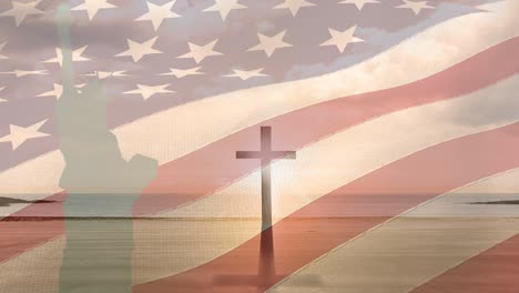 animation of crucifix and statue of liberty moving over american flag