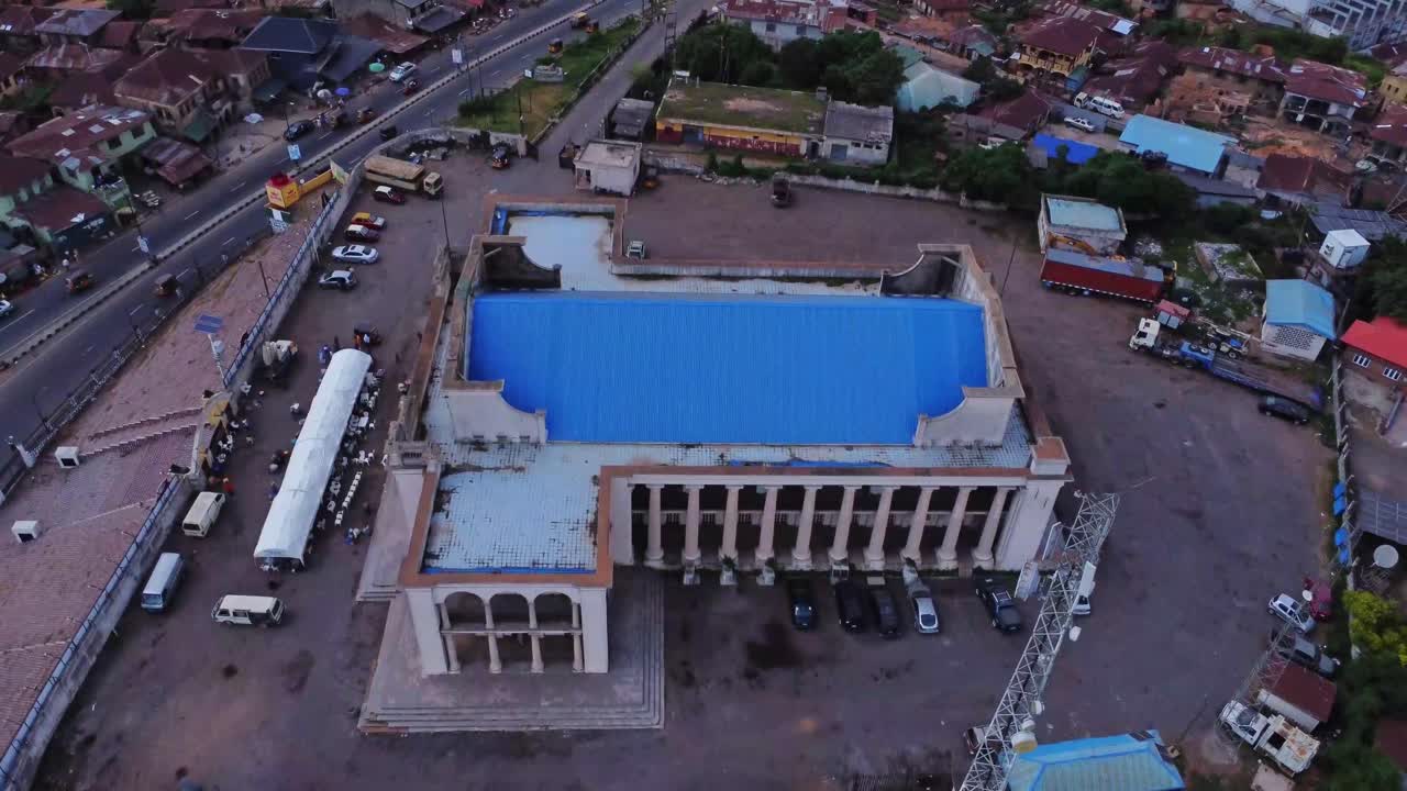 Drone flying over Mapo Hall in the city of Ibadan, Nigeria. Mapo Hall is one of the oldest buildings in the African country