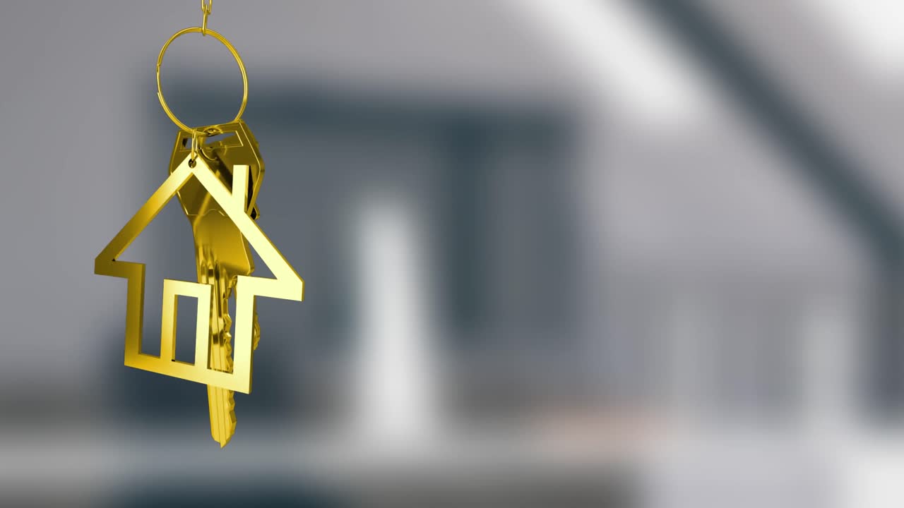 Animazione di una chiave con portachiavi a forma di casa su sfondo sfocato