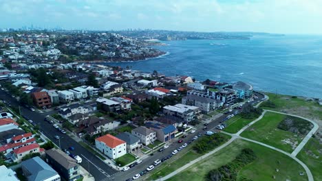 Drone-aerial-residential-housing-apartment-blocks-South-Coogee-headland-coastline-bay-Pacific-Ocean-Sydney-Maroubra-beach-Australia-travel-tourism