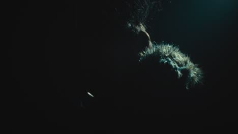 a creepy witch rises her head during the night storm