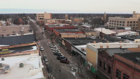 aerial, drone flying down main street of a small town in the united states