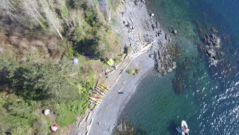 aerial view of group cleaning up remote island on the pacific