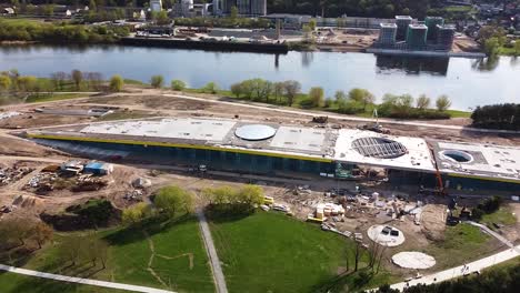 Modern-science-center-construction-on-Nemunas-island,-aerial-view