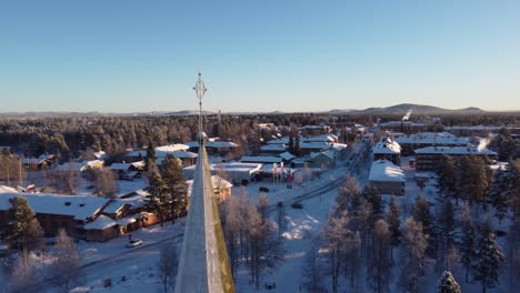 arvidsjaur church spire in winter evening in norrbotten province, sweden