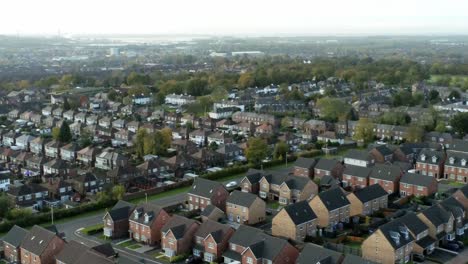 typical northern english town suburban housing estate aerial view descending slow shot