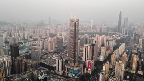 extreme wide aerial shot of luohu district in shenzhen china, hazy weather