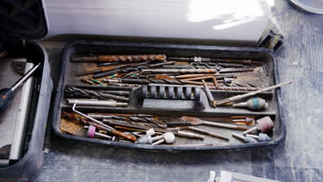 Close-Up-Of-Workmans-Tools-In-Toolbox-Viewed-From-Above