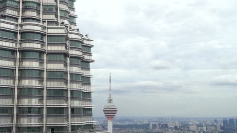 menara berkembar petronas kuala lumpur malaysia and backgrounds kl tower tilt shot