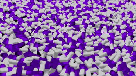 una gran pila de pastillas blancas y púrpuras