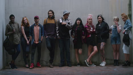 portrait group of multi racial friends talking enjoying chatting together socializing young college students wearing stylish urban fashion human individuality slow motion