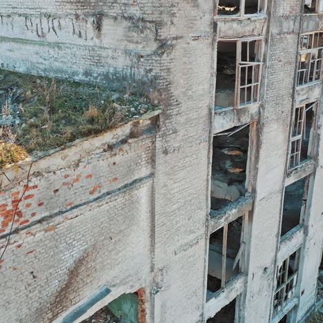 ruined roof of an old abandoned factory. industrial building for demolition. aerial view.