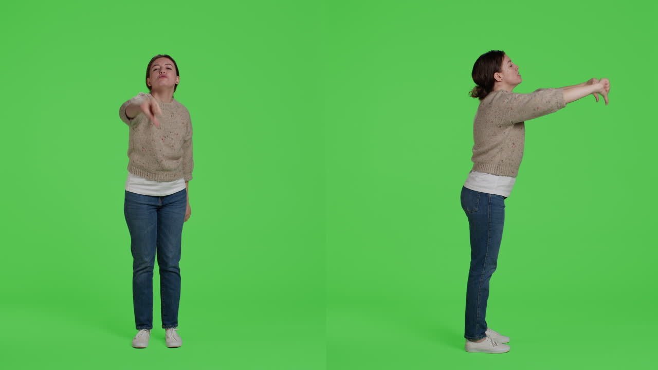 Woman Giving Thumbs Down on Green Screen