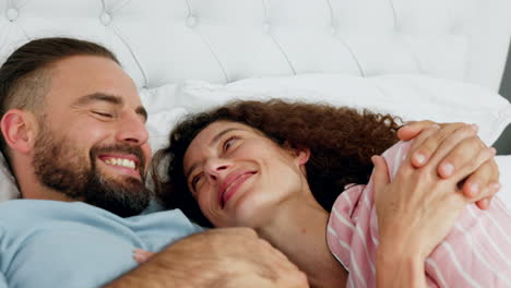 Love,-relax-and-comic-couple-in-bed-together