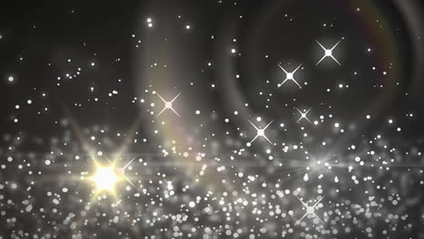 animatie van vallende gloeiende lichten op een donkere achtergrond
