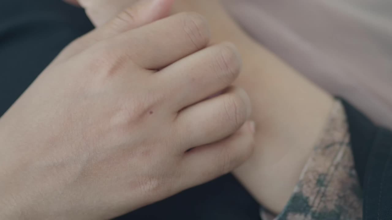 Close-up of a Person's Hand and Arm