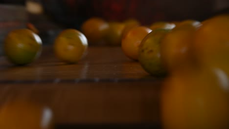 oranges on the conveyor belt falling fast