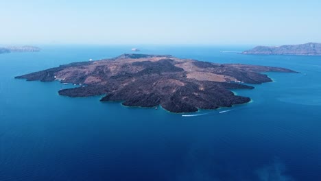 Aerial-Point-of-Interest-Shot-of-Volcano-in-Santorini-Island-Greece,-4K-Footage